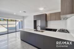  9 Garzoni La Landsdale WA 6065 $729,000 Step into contemporary sophistication with this as-new townhouse in one of Landsdale’s newest and most sought-after developments. Garzoni Lane boasts a sleek, minimalist design with exceptional functionality, perfect for those seeking a stylish and low-maintenance lifestyle. PRIME LOCATION Located in a premium pocket of Landsdale, this modern townhouse offers the best of both convenience and tranquility. Positioned approximately 30 minutes from Perth CBD and Perth Domestic Airport, it provides easy access to: Kingsway Sporting Complex – a hub for sports and outdoor activities Hillarys Boat Harbour – a perfect spot for weekend leisure The Swan Valley – renowned for its wineries and dining experiences Nearby schools, shopping centres, and public transport – ensuring everyday convenience Enjoy the perks of urban living while still relishing the peaceful surroundings. PERFECT FOR A RANGE OF BUYERS Whether you’re a first-home buyer, downsizer, investor, FIFO worker, or empty nester seeking a lock-and-leave residence, this contemporary townhouse is a standout opportunity. PROPERTY FEATURES 9 Garzoni Lane includes: ✔ 3 spacious bedrooms – Bedrooms 2 and 3 are located on the ground floor, while the master suite with ensuite is positioned on the first floor. ✔ 2 stylish bathrooms – Designed with floor-to-ceiling tiles, high-end tapware, and sleek glass shower screens. ✔ Open-plan living and dining – Expansive light-filled spaces with high ceilings throughout. ✔ Modern kitchen – Equipped with stone benchtops, a large oven, gas cooktop, and built-in recesses for microwave and dishwasher. Includes a built-in rangehood, double sink, and a fridge recess. ✔ Quality flooring throughout – Ceramic tiles in main living areas, plush carpets in bedrooms and stairs. ✔ Convenient laundry – Located within the garage, offering ample storage solutions. ✔ Climate control – Ducted reverse-cycle air-conditioning throughout for year-round comfort. ✔ Double garage – Spacious with an under-stair storage recess. ✔ Outdoor spaces – Generously sized areas ideal for entertaining or unwinding, with landscaped front and rear yards. ADDITIONAL INFORMATION Year Built: Completed in 2024 Availability: Vacant possession available Zoning: Residential (Strata) Council: City of Wanneroo Nearby Schools: Landsdale Primary School, Landsdale Christian School, Carnaby Rise Primary School, and Kingsway Christian School Low strata fees: $219.40 per quarter (admin & reserve) as at Jan 2025 This contemporary townhouse is a rare opportunity to secure a stylish and low-maintenance home in a thriving community.  