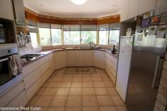  22 Barron Close Pink Lake WA 6450 $920,000 Nestled on 5,042sqm of beautifully landscaped grounds, this exceptional property boasts water-wise gardens with full reticulation and a prime position overlooking the 13th green of Pink Lake Golf Course. Home Features: • Spacious open-plan living with a large kitchen, breakfast bar, and servery • Elegant double timber door entry leading to a lounge with reverse cycle air conditioning and tile fire • Master suite with His & Hers robes and a private ensuite featuring a spa • Two additional bedrooms, a second bathroom, and laundry on the lower level • Rich timber staircase leading to an expansive games room with a timber bar & pool table (included!) • 4th bedroom plus a separate sunroom for year-round relaxation Outdoor & Additional Features: • 13m x 8m powered workshop – ideal for projects or extra storage • 68,000L rainwater storage • Immaculate, low-maintenance gardens with full reticulation Enjoy the perfect blend of space, serenity and stunning views in this unique home.  