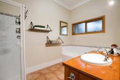  8 Sarnia Avenue Mildura VIC 3500 $599,000 - $658,000 Damian Portaro, Managing Director at Ray White Mildura, proudly presents 8 Sarnia Avenue, Mildura-an extraordinary blend of 1930s charm and contemporary family living. Heading to auction on February 28th at 12pm, this stunning Californian bungalow style home has been tastefully renovated while preserving its timeless appeal. From the moment you arrive, the captivating façade sets the tone for what lies beyond. Step inside and be welcomed by polished floorboards, ornate period features, and a beautifully designed layout that caters to modern family life. The residence boasts four spacious bedrooms, including a master suite with an ensuite, plus a separate study for those working from home. The updated kitchen, complete with a walk-in pantry, seamlessly integrates with the open-plan meals and living area, creating a warm and inviting space. A second living/play area ensures flexibility for growing families, while the centrally located bathroom services the additional bedrooms. But the charm doesn't stop there. Outside, the huge decked outdoor area with a pitched roof is perfect for year-round entertaining. The property also includes a fully equipped rumpus room and a detached street-facing office, ideal for a home business setup. For those needing extra storage and workspace, the rear lane access leads to impressive shedding, including a 6x9m shed and a 12x6m shed, catering to all your needs. And when it's time to unwind, the magnesium mineral pool with heating, cooling, and a splash pad offers the ultimate in relaxation and fun. Additional features include ducted gas heating, slow combustion heating, and two evaporative cooling units for year-round comfort. Beautifully maintained gardens and a three-car carport complete this exceptional offering. Located in a sought-after pocket of Mildura, close to schools, shopping, and parklands, 8 Sarnia Avenue is a rare opportunity to secure a beautifully renovated character home with an incredible lifestyle package. 