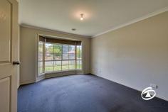  52A Lesdon Ave Cranbourne VIC 3977 $520,000 - $570,000 Discover a world of opportunity with this charming residence, ideally located in a peaceful enclave just a short walk from lush parkland, shopping, and public transport options. This home, in its original condition, offers a fantastic starting point for renovation, allowing you to bring your dream vision to life. The light-filled living room flows seamlessly into the central kitchen, while ducted heating and evaporative cooling ensure year-round comfort. Three generously sized bedrooms await, including a master suite with a walk-in robe and ensuite. The family bathroom conveniently services the second and third bedrooms. The compact yard is ready to be transformed into the perfect outdoor entertaining area, offering endless possibilities. Plus, there’s secure car accommodation for two vehicles. This property offers exceptional potential for the right buyer. Don’t miss out on making this your dream home. 