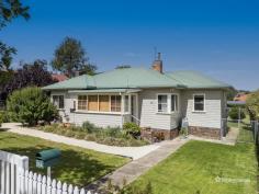  51 Taylor Street Armidale NSW 2350 $440,000 - $480,000 Welcome to 51 Taylor Street, a beautifully presented two-bedroom home in the desirable North Hill area. Perfectly positioned close to public schools and local corner stores, this home offers both charm and comfort in a sought-after location. Step inside to find two generously sized bedrooms, each featuring built-in wardrobes for ample storage. The warm and inviting living room boasts plush carpet, neutral tones, and abundant natural light, creating a cozy retreat for relaxation. The galley-style kitchen offers plenty of storage and flows seamlessly into the adjoining dining area, where polished floorboards and a charming wood fireplace set the scene for memorable family meals. The main bathroom is well-equipped with a shower, toilet, and vanity, while an additional toilet is conveniently located in the laundry. Outside, you’ll love the open and level backyard, complete with beautifully manicured garden beds. A double carport, single lock-up garage, and fully fenced front and backyard ensure security and practicality for any homeowner. Don’t miss this fantastic opportunity to secure a well-maintained home in an excellent location.  