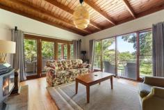  9A Murrawal Road Stanwell Park NSW 2508 Every day will feel like a holiday at this resort style family home, nestled amongst the trees. Entertain friends and family, surrounded by native birdlife while the kids play in the adjacent parklands, then take a stroll down to the beach for some sun, sand and swimming. Life doesn't get much better than this. YOUR HOME * Offering a versatile layout with multiple indoor+outdoor living spaces, a free flowing open design and plenty of picturesque areas to escape the outside world. The home is ideal for both hosting friends and family, or kicking back while enjoying the leafy surroundings and sounds of the nearby ocean. * To the east, the property flows directly on to a large grassed parkland. Enjoy all the perks without any of the maintenance, kicking a ball with kids, games of cricket with friends or setting up a picnic blanket and watching the world go by. * Having a literal babbling brook running beside the home completes the picture of tranquility. * Relax on the deck and enjoy your morning coffee or glass of wine whilst taking in the beautiful views and ocean glimpses. * Previously, the property operated as a successful bed & breakfast and is one of the few properties in the area that is licensed to do so. For those looking for a unique business opportunity, look no further. * Generously sized parents retreat boasts a private sitting area, walk-in robe, ensuite and of course a picturesque outlook. It's the perfect place to retreat after a long day. * A large double lock-up garage provides secure parking as well as space to store the boards, bikes and other must-have toys, when living on the coast. * The home has been well loved and well maintained, so there is nothing left to do but move in and start enjoying your new beachside lifestyle. * Positioned on a generous 1,054.5m2 block with R2 residential zoning. YOUR LOCATION * This unique location allows you to walk out the back door and directly down to the beach. * One of Stanwell Park's most popular, being quiet with very little traffic and plenty of friendly long term residents. * Only a moment's stroll to the pristine Stanwell Park beach which is fully patrolled, offers fantastic surf breaks and is dog friendly. * You can leave the car at home as the local cafes, school, shops and restaurants are all only minutes from your front door. * The Royal National Park is situated just 10 minutes drive. * Stanwell Park is located approximately 1 hour South of Sydney CBD and approximately 30 minutes North of Wollongong CBD. * Embrace the quintessential coastal lifestyle and all that comes with it... swimming, fishing, bushwalking, hang gliding and family picnics in popular parklands all available only moments from your doorstep. 