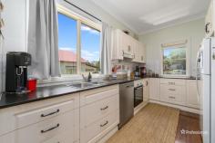  51 Taylor Street Armidale NSW 2350 $440,000 - $480,000 Welcome to 51 Taylor Street, a beautifully presented two-bedroom home in the desirable North Hill area. Perfectly positioned close to public schools and local corner stores, this home offers both charm and comfort in a sought-after location. Step inside to find two generously sized bedrooms, each featuring built-in wardrobes for ample storage. The warm and inviting living room boasts plush carpet, neutral tones, and abundant natural light, creating a cozy retreat for relaxation. The galley-style kitchen offers plenty of storage and flows seamlessly into the adjoining dining area, where polished floorboards and a charming wood fireplace set the scene for memorable family meals. The main bathroom is well-equipped with a shower, toilet, and vanity, while an additional toilet is conveniently located in the laundry. Outside, you’ll love the open and level backyard, complete with beautifully manicured garden beds. A double carport, single lock-up garage, and fully fenced front and backyard ensure security and practicality for any homeowner. Don’t miss this fantastic opportunity to secure a well-maintained home in an excellent location.  