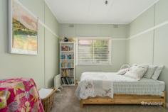  51 Taylor Street Armidale NSW 2350 $440,000 - $480,000 Welcome to 51 Taylor Street, a beautifully presented two-bedroom home in the desirable North Hill area. Perfectly positioned close to public schools and local corner stores, this home offers both charm and comfort in a sought-after location. Step inside to find two generously sized bedrooms, each featuring built-in wardrobes for ample storage. The warm and inviting living room boasts plush carpet, neutral tones, and abundant natural light, creating a cozy retreat for relaxation. The galley-style kitchen offers plenty of storage and flows seamlessly into the adjoining dining area, where polished floorboards and a charming wood fireplace set the scene for memorable family meals. The main bathroom is well-equipped with a shower, toilet, and vanity, while an additional toilet is conveniently located in the laundry. Outside, you’ll love the open and level backyard, complete with beautifully manicured garden beds. A double carport, single lock-up garage, and fully fenced front and backyard ensure security and practicality for any homeowner. Don’t miss this fantastic opportunity to secure a well-maintained home in an excellent location.  