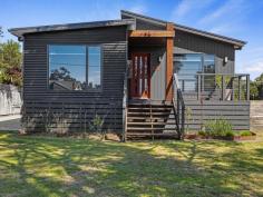  44 Ross St Port Welshpool VIC 3965 $665,000-$685,000 Sure to appeal to the most fastidious buyer and offering an ideal alternative to the hassles of building, this immaculate contemporary home ticks so many boxes. Set on approx. 1007m2 of flat usable land with space to add a large shed (STCA) to house your boat, caravan and beach toys. Low maintenance and filled with natural light, the stylish interior is open plan with a spacious living room that flows out to an entertaining deck, taking in glimpses of the Prom mountains. Stunning kitchen with gleaming white cabinetry, large island bench and 900mm stove with gas multi burner hob. Four bedrooms - master with walk in robe and ensuite bathroom. Central family bathroom plus fitted laundry / utility room. Built to current regulations with cost effective features including double glazing, RC/AC for year round comfort, town water and tank for the garden. Established vegetable garden in raised beds with watering system, LU shed for gardening equipment, concrete parking area and accessed via a sealed road. Possibility to purchase fully furnished and ready to generate immediate income as a holiday rental. With the pristine coastline and 4 lane all-weather boat launching ramp just a 3 minute walk away, and the cycling / walking trail leading to the Great Southern Rail Trail at the end of the street, this is the perfect spot for relaxing holidays or peaceful full time living with the great outdoors on your doorstep. 