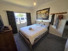  16 Dixon Street Nulsen WA 6450 $355,000 This charming 3-bedroom home, complete with a fully renovated bathroom, exudes character and comfort. The modern kitchen features a dishwasher, under-bench stove, gas hob and ample storage with overhead cupboards, seamlessly flowing into the open lounge area with reverse-cycle air conditioning. Outside, enjoy the convenience of a rainwater tank, a 4m x 7m garage and 2 garden sheds. The large gravel hardstand sits securely behind Colorbond fencing with a retractable gate. The spacious, lawned backyard is perfect for gardening, complete with veggie beds. Schools and local shopping close by. 