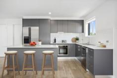  2/7 Strata Avenue Barrack Heights NSW 2528 $849,000 Spanning two levels, this Torrens Title home offers the ultimate in lifestyle and locale. Step inside to discover a modern kitchen with an electric cooktop and stone bench tops that seamlessly flow into a separate lounge and dining area, creating an inviting space for entertaining and relaxation. While a flexible space downstairs can serve as a fourth bedroom or be transformed into a convenient home office. You'll gravitate to the large open-air courtyard, which provides the perfect escape from the daily grind. Here, you can leisurely exercise your green thumb, enjoy the sunshine, or host dinner parties under the stars. Upstairs, the primary bedroom feels like a private retreat with a generous walk-in robe and modern ensuite. Two additional bedrooms with ceiling fans, built-in robes, and a neutral-toned main bathroom with a tub complete this thoughtfully designed home. Ideally located close to everyday amenities, this enviable address offers the very best of suburban living with shops, schools, parklands, and local beaches all within easy distance and Shell Cove Marina only a short drive away. Enjoy the freedom of Torrens Title living Modern kitchen, bathrooms + guest toilet Courtyard with low-maintenance landscaping Single car garage with additional space Short drive from schools, parks, beaches 