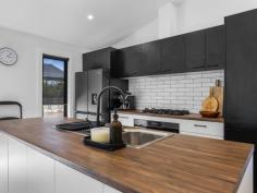  44 Ross St Port Welshpool VIC 3965 $665,000-$685,000 Sure to appeal to the most fastidious buyer and offering an ideal alternative to the hassles of building, this immaculate contemporary home ticks so many boxes. Set on approx. 1007m2 of flat usable land with space to add a large shed (STCA) to house your boat, caravan and beach toys. Low maintenance and filled with natural light, the stylish interior is open plan with a spacious living room that flows out to an entertaining deck, taking in glimpses of the Prom mountains. Stunning kitchen with gleaming white cabinetry, large island bench and 900mm stove with gas multi burner hob. Four bedrooms - master with walk in robe and ensuite bathroom. Central family bathroom plus fitted laundry / utility room. Built to current regulations with cost effective features including double glazing, RC/AC for year round comfort, town water and tank for the garden. Established vegetable garden in raised beds with watering system, LU shed for gardening equipment, concrete parking area and accessed via a sealed road. Possibility to purchase fully furnished and ready to generate immediate income as a holiday rental. With the pristine coastline and 4 lane all-weather boat launching ramp just a 3 minute walk away, and the cycling / walking trail leading to the Great Southern Rail Trail at the end of the street, this is the perfect spot for relaxing holidays or peaceful full time living with the great outdoors on your doorstep. 
