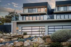  12B Beach Road Stanwell Park NSW 2508 Welcome to 12B Beach Road, Stanwell Park, a stunning coastal residence which perfectly captures the essence of beachside living, blending contemporary aesthetics with relaxed elegance. Ideally located for those seeking the advantages of low-maintenance coastal life in a desirable area - only 200m to the ever popular Stanwell Park beach. What You Will Love: • Bright and Airy Atmosphere: This tri-level home is filled with natural light and refreshing ocean breezes, creating a welcoming ambience. • Stylish Layout: Enjoy three spacious bedrooms, two modern bathrooms, and inviting living areas designed for comfort offering polished burnish concrete floors, ducted air throughout and top of the Bosch appliances and finishes with Italian made E1 hydraulic lift access to all levels. • Gourmet Kitchen:On the first floor, the seamless integration of living, dining, and kitchen areas creates an inviting space for gatherings or relaxation, with the option to enjoy the peaceful courtyard or the spacious alfresco balcony capturing the stunning beach , surf and coastal views. • Outdoor Space: Expansive balconies on two levels capture unobstructed east facing views of local beaches and west to the escarpment, as well as a private courtyard. Each are perfect for relaxing or entertaining after a day at the beach. • Characterized by modern coastal living : the upper level of the residence features three bedrooms, two bathrooms, and a bonus study / flexible living area, all accentuated by soaring ceilings. The master suite boasts a balcony offering stunning beach, ocean and escarpment views, complemented by a modern ensuite and walk-in robe, providing a luxurious retreat after a day under the sun. • Easy Living: Ideal for both short getaways and full-time living, this home offers an enjoyable low-maintenance lifestyle just 200 meters level stroll to the beach and offering stunning ocean and escarpment views, low maintenance gardens and is less than one year old. Property Highlights: Near new Torrens title home. Two modern bathrooms with heated floors, the main bathroom with stand alone bathtub Open concept kitchen, dining, and living areas with polished burnish concrete floors High quality appliances and fixtures throughout A bonus study / flexible living space Balconies taking in the spectacular ocean and escarpment views. In addition to a private courtyard for outdoor entertaining Landscaped yard designed with coastal terrain and established gardens Indoor/outdoor flow with multiple glass sliding doors optimising the stunning views Ample Storage options Oversized two car garage + storage Italian made E1 hydraulic Lift accessing all levels Ducted air throughout as well as a 74 inch wall mounted fireplace Security cameras Location: Only 200 meters to the beach and parks with spectacular uninterrupted views Short stroll to Stanwell Park Village; cafes and shops 5 Minutes to train station One hour to Sydney CBD 30 minutes to Wollongong Experience the best of coastal living, where every detail has been carefully crafted for your enjoyment and comfort. 