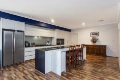  23 Aralia Way Forrestfield WA 6058 $899,000 Be ready to be wowed from the moment you walk through the doors by this huge modern 220sqm family home. Located on a large private 820SQM block and tucked away on private secluded cul-de-sac you will find this fabulous large 3- or 4-bedroom 2 bathroom plus a powder room boasting large flowing open plan family friendly home with 3 huge living areas and a fantastic open plan kitchen and all only 6 years old. From the moment you walk into the home you are greeted with a large welcoming entry that takes you into the spacious open plan family/dining area complete with island bench all finished with stone bench tops and quality soft close cabinetry, 900ml gas cooktop with two electric oven where you can cook up a storm while entertaining with friends or keeping an eye on the family all in the comfort of reverse cycle ducted air-conditioning. Then there is the separate theatre room or 4th bedroom you decide, there is so much space in this beautiful home. The master bedroom located away from the other bedrooms with double his and hers walk-in robe areas, and comes complete with a fantastic ensuite, while the other bedrooms are all a double bed size with built in robes. This home comes is a massive main living areas that lead out to the rear and a kitchen second to none. The second bathroom down the hall services the other double bedrooms and there is a separate powder room off the hall, a large laundry is packed with plenty of space and storage. Outside you will think that you are in the park, the lovely outdoor patio is second to none and is ready for those large family or friends to sit back and be entertained in style. The low care gardens with ample space on this 800sqm block has easy entry for a swimming pool, spa garage and more. Everything has been thought of in this home, the secure gardens make for a great entertaining or Kids play area. Located in a fantastic street in the quality area of Forrestfield, I don’t expect this one to last so call me for your viewing. SOME KEY FEATURES • 3 or 4 Double Bedrooms, 2 Bathrooms • Huge Modern Open Plan Living with 3 areas, Lounge, Family/Dining area • Separate Theatre or bed number 4 • Quality fittings throughout • 800sqm block with side easy entry • Reverse Cycle Ducted Air conditioning • Gas hot water and cooking • Solar Power Panels • Powder Room • Double high entry garage Be Impressed 