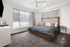  23 Arravanda Crescent Pallara QLD 4110 $1,049,000  Tucked away in a quiet, family-friendly street, this modern 4-bedroom masterpiece isn’t just a house-it’s been a sanctuary of love, laughter, and cherished moments for its current owners since it was built in 2021. From hosting movie nights in the soundproofed cinema room to Sunday morning coffees under the patio as the kids played in the backyard, every corner of this home has a story. Set on a generous 414m² block, this home was designed to blend sophisticated style with everyday functionality. From the moment you step through the front door, you can feel it: this is where comfort meets elegance. A Kitchen Made for Connection The heart of the home-an open-plan kitchen-has been the backdrop to countless family dinners and late-night chats. With 40mm Caesarstone benchtops, a walk in pantry for seamless organisation, and premium Westinghouse appliances, it’s a chef’s dream. The large window above the cooktop not only fills the space with natural light, but also offers a clear view of the backyard-perfect for watching the kids or keeping an eye on the pets. Entertainment, Elevated The fully soundproofed cinema room has been the go-to spot for weekend movie marathons and game day screenings. Complete with custom doors and the option to purchase the $10K Optoma projector, screen and surround sound setup, this space was built for unforgettable moments. Rest and Recharge in Style The master suite is a true retreat, featuring luxurious carpets underfoot, a spacious walk-in robe, and an ensuite that rivals any five-star hotel-complete with a double vanity and oversized rain shower. The additional bedrooms are equally impressive, offering ducted air conditioning, mirrored wardrobes, and plenty of space for children, guests, or even a home office. Modern Comforts, Thoughtfully Designed The main bathroom is both stylish and practical, with a handheld and rainforest shower head and built-in shower caddy, and a separate toilet for added convenience. Every element has been carefully considered. Outdoor Living, All Year Round Whether it’s a barbecue with friends or a quiet evening under the stars, the outdoor patio-with ceiling fan and ambient lighting-has seen it all. The private backyard is low-maintenance yet inviting, ideal for family fun or simply unwinding after a long day. Additional Features: High 2.7m ceilings for a spacious, airy feel dishwasher and retractable tap. Smart Air Touch ducted A/C system Double lock-up garage. Large Laundry with Ample Storage Quality wood-look vinyl flooring and plush top of the range charcoal carpets. Why They Loved It Here For the current owners, this home has been more than just four walls-it’s been the setting for milestones, growth, and treasured memories. Now, it’s ready for its next chapter. If you’re searching for a home that offers both luxury and lifestyle-where every feature has been designed with real living in mind-this is your opportunity. 