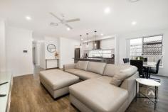  23 Arravanda Crescent Pallara QLD 4110 $1,049,000  Tucked away in a quiet, family-friendly street, this modern 4-bedroom masterpiece isn’t just a house-it’s been a sanctuary of love, laughter, and cherished moments for its current owners since it was built in 2021. From hosting movie nights in the soundproofed cinema room to Sunday morning coffees under the patio as the kids played in the backyard, every corner of this home has a story. Set on a generous 414m² block, this home was designed to blend sophisticated style with everyday functionality. From the moment you step through the front door, you can feel it: this is where comfort meets elegance. A Kitchen Made for Connection The heart of the home-an open-plan kitchen-has been the backdrop to countless family dinners and late-night chats. With 40mm Caesarstone benchtops, a walk in pantry for seamless organisation, and premium Westinghouse appliances, it’s a chef’s dream. The large window above the cooktop not only fills the space with natural light, but also offers a clear view of the backyard-perfect for watching the kids or keeping an eye on the pets. Entertainment, Elevated The fully soundproofed cinema room has been the go-to spot for weekend movie marathons and game day screenings. Complete with custom doors and the option to purchase the $10K Optoma projector, screen and surround sound setup, this space was built for unforgettable moments. Rest and Recharge in Style The master suite is a true retreat, featuring luxurious carpets underfoot, a spacious walk-in robe, and an ensuite that rivals any five-star hotel-complete with a double vanity and oversized rain shower. The additional bedrooms are equally impressive, offering ducted air conditioning, mirrored wardrobes, and plenty of space for children, guests, or even a home office. Modern Comforts, Thoughtfully Designed The main bathroom is both stylish and practical, with a handheld and rainforest shower head and built-in shower caddy, and a separate toilet for added convenience. Every element has been carefully considered. Outdoor Living, All Year Round Whether it’s a barbecue with friends or a quiet evening under the stars, the outdoor patio-with ceiling fan and ambient lighting-has seen it all. The private backyard is low-maintenance yet inviting, ideal for family fun or simply unwinding after a long day. Additional Features: High 2.7m ceilings for a spacious, airy feel dishwasher and retractable tap. Smart Air Touch ducted A/C system Double lock-up garage. Large Laundry with Ample Storage Quality wood-look vinyl flooring and plush top of the range charcoal carpets. Why They Loved It Here For the current owners, this home has been more than just four walls-it’s been the setting for milestones, growth, and treasured memories. Now, it’s ready for its next chapter. If you’re searching for a home that offers both luxury and lifestyle-where every feature has been designed with real living in mind-this is your opportunity. 