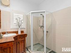  10 Penang St Point Clare NSW 2250 $1,240,000 - $1,280,000 Offered to the market for the first time in 60 years, this beautiful mid-century style home is a rare gem. Lovingly maintained by the same family, its retro appeal and incredible views makes it a ready-to-move-in opportunity for its new owners. Expansive windows throughout the home flood the interior with natural light, while showcasing breathtaking water views that stretch from Lion Island and Point Frederick to the Gosford waterfront and city skyline — creating a captivating outlook both day and night. Set on a generous 1,012sqm block in one of Point Clare’s most sought-after streets, with a national park as its backyard, this home is an exceptional find. Perfect for commuters who want to be a short walk from a train station or need a quick exit to the freeway. Located close to excellent schools, hospitals and important amenities, do not miss your chance to secure this remarkable piece of real estate. Features to Note: • Thoughtfully positioned front veranda and two rear entertaining areas maximize the stunning aspect and ensure privacy. • The terraced backyard provides a functional and safe space for children. • Secure fencing makes the backyard ideal for furry friends. • Three upstairs bedrooms, with floor-to-ceiling wardrobes; two of the bedrooms have plantation shutters and water views. • The main bathroom includes a shower, toilet, feature timber vanity, and plantation shutters. • Downstairs there is a 4th bedroom, a second bathroom with a shower, toilet, and vanity, plus a large living area—perfect for a teenage retreat, parent’s getaway, or extended family accommodation. This area can be divided from the upper floor to create a separate living space with a kitchenette and its own entry. • Expansive formal lounge with air conditioning and large feature windows with some of the best views on the Central Coast. • Formal and informal dining options. • Well-equipped kitchen featuring a Miele dishwasher, electric cooktop, Bosch oven, rangehood, plantation shutters, and ample storage space. • Single garage with an automatic roller door, plus extra space for a workshop and under-house storage. • Original timber flooring throughout the upper level, with new carpet on the lower level. • This home has a level front garden, 9kw solar system and has been freshly painted internally and externally. Convenient Distances: • Point Clare Train Station – approx. 700m • Brisbane Waters Waterfront – approx. 1.1km • Point Clare Primary School – approx. 350m • Point Clare Medical Centre & Chemist – approx. 640m • Point Clare Aldi – approx. 700m • Point Clare Shopping Precinct – approx. 740m • West Gosford Shopping Precinct – approx. 2.4km • National Park Walking Trails – approx. 150m • M1 Pacific Motorway – approx. 7km 