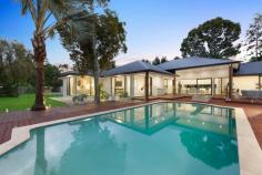  457 Tallebudgera Creek Road Tallebudgera Valley QLD 4228 $5,999,000 Welcome to "Willow Park," an extraordinary private sanctuary where contemporary luxury meets serene natural beauty. Nestled on an expansive and level 1.86-acre estate with direct frontage to the picturesque Tallebudgera Creek, this newly built residence is a masterpiece of modern design, offering a lifestyle of unparalleled tranquillity and sophistication. From the moment you arrive, an oversized glass entryway framed by a striking stone feature wall and elegant chandelier sets the tone for the grandeur that lies within. Beyond the welcoming foyer, the heart of the home unfolds into an expansive open-plan living, dining, and kitchen area, crowned by soaring cathedral ceilings with VJ panelling. Designed to embrace natural light and breath-taking views, floor-to-ceiling windows and a dramatic stone-clad feature wall create an atmosphere of refined opulence. The gourmet kitchen, an entertainer's dream, boasts an oversized island bench, premium Electrolux appliances, a glass splashback, and an integrated dishwasher drawer. A fully equipped butler's pantry with a wine fridge, additional sink, and Miele dishwasher ensures effortless hosting. Meanwhile, five generously proportioned bedrooms, four luxurious bathrooms, and an additional powder room are thoughtfully positioned throughout the home. The master suite, a private retreat in its own wing, is an oasis of indulgence. Overlooking the pool and lush surroundings, it features a custom-designed dressing room with bespoke cabinetry, a beauty station, and an opulent ensuite complete with a freestanding bath, dual vanity, and floor-to-ceiling tiling. Three additional bedrooms include custom built-in robes, with two enjoying the convenience of modern ensuites. A versatile fifth bedroom, ideal as a home office, completes the accommodation. For those who appreciate cinematic experiences, a soundproof media room offers the perfect setting for family movie nights or immersive entertainment. Step outside into an enchanting natural wonderland, where mature trees, manicured lawns, and pristine creek frontage create a breathtaking backdrop. A vast covered timber deck, complete with an outdoor kitchen, sets the stage for unforgettable alfresco gatherings, while the resort-style pool, featuring a diving board and timber decking, invites endless enjoyment. For moments of relaxation, a spa and sun deck await, along with a charming poolside pavilion where you will find the sauna and a separate pool house with barn-style entry and powder room. As the sun sets, gather around the firepit and soak in the peaceful ambience of this unparalleled setting or move to the purpose built creek side deck overlooking the sprawling lawn. Every aspect of this home has been carefully curated for comfort and convenience. State-of-the-art inclusions such as ducted air-conditioning, LED lighting, security alarm and CCTV cameras, Wi-Fi boosters, an electric gated entrance with intercom, and a Yale security system ensure effortless modern living. Sustainable features include a 13.2kW solar system, electric hot water, and town water supply with additional pumping rights from Tallebudgera Creek. Perfectly positioned, "Willow Park" is just minutes from top-tier schools such as Tallebudgera State School and St. Andrews Lutheran College. The iconic beaches of Burleigh Heads, Palm Beach, and Currumbin are within a short drive, offering the best of coastal living, while Gold Coast Airport and Surfers Paradise are also easily accessible. This exceptional residence is a rare opportunity to secure a home of distinction in one of the most sought-after locations. All the hard work has been done—simply move in and immerse yourself in the luxury and serenity of "Willow Park." Arrange your private inspection today and experience the pinnacle of Gold Coast acreage living. - Ducted air-conditioning - LED lighting - Security alarm and CCTV cameras - Wi-Fi boosters - Electric gated entrance with intercom - Yale security system - 13.2kW solar system - Electric hot water - Town water supply with additional pumping rights from Tallebudgera Creek - Property features: - Expansive and level 1.86-acre estate with Tallebudgera Creek frontage - Newly built, architecturally designed home - Oversized glass entryway with a stone feature wall and chandelier - Open-plan living, dining, and kitchen area with cathedral ceilings - Floor-to-ceiling windows and a striking stone-clad feature wall - Gourmet kitchen with an oversized island, premium Electrolux appliances, and glass splashback - Butler's pantry with a wine fridge, sink, and Miele dishwasher - Soundproof media room for immersive entertainment - Five spacious bedrooms, including a master retreat in its own wing - Four luxurious bathrooms plus an additional powder room - Master suite with custom dressing room, beauty station, and spa-like ensuite - Covered timber deck with an outdoor kitchen - Resort-style pool with diving board and timber decking - Spa, sun deck, and poolside pavilion - Firepit area for relaxed evenings outdoors - Pool house with barn-style entry and powder room Location benefits: - Approx. 5 mins to Tallebudgera State School and local shops - Approx. 5 mins to St. Andrews Lutheran College - Approx. 11 mins to Burleigh Heads - Approx. 12 mins to Palm Beach - Approx. 14 mins to Currumbin Beach - Approx. 18 mins to Gold Coast Airport - Approx. 39 mins to Surfers Paradise 