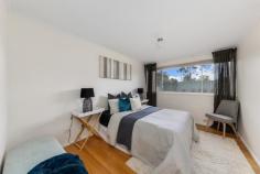  18 Woralul Street Waramanga ACT 2611 The charm and style of this 3 bedroom ensuite home on a large block cannot be overstated. A perfect home for a young family, downsizers, investors or extenders alike. Walk up to this lovingly well kept home surrounded by Australian flora, and you'll be struck by the long driveway and private front garden. Step inside and you'll be drawn to the solid Ash timber hardwood floors, leafy aspects, bright white walls, and wooden architraves which instil a sense of warmth and freshness. To the right, you're met with the elevated living spaces. Up the steps is the open plan dining room and charming kitchen, with its rich wooden cabinetry, island countertop, blue detailing, and adorable painted tiling in the backsplash. This heart of the home is where everyday family memories are made. Perfect for hosting together, or relaxing alone. Continue through the home, and you'll be met with a spacious living room. Well lit, airconditioned, and including the same polished wooden floorboards you'll find throughout the house. Slide open the floor to ceiling glass doors to bring the outside in, access the covered patio and let the house breathe the summer breeze. This patio is shady, airy, and expansive, all opening onto the large green back garden surrounded by planters and potential. You'll imagine long summer evenings with good wine and great conversation. To the left… make your way down the hall where you'll be welcomed by the bedrooms. Each has its own personality, with large windows and leafy aspects. The generous master boasts a walk-through wardrobe to keep your clothes and treasures tucked away. The ensuite bathroom is spacious and light, with retro wood and gold detailing. Tree-lined Waramanga is known for its peace, quiet and friendly community. It's the perfect place to provide an idyllic childhood or relaxing retirement. Close to public and private schools, Waramanga shops, Cooleman Court, Woden town centre, public transport and Mount Arawang's walking trails, the location perfectly balances city and nature. YOUR NEW HOME FEATURES Sunlit 3 bedroom ensuite home on large block Living room with timber glass sliding doors which flow out to the alfresco Renovated kitchen with gas cooktop, electric oven and dishwasher Master bedroom with walk in robe and ensuite Renovated main bathroom with bath Separate toilet Separate laundry with garden access Polished solid Ash timber hardwood floors and new blinds throughout Reverse cycle split system heating and cooling Established front and back gardens with Australian natives and other exotic species Large, secure and low maintenance back garden Double carport with storage shed Long private driveway and plenty of off street parking Walking distance to Waramanga shops and Cooleman Court Close to popular schools, public transport, Westfield Woden and major arterial roads to all areas of the city STATISTICS (all figures are approximate) EER: 0 Home Size: 110.55 sqm Carport: 44.16 sqm Land Size: 845 sqm Land Value: $591,000 (2024) Rates: $3,605 per annum Land Tax: $6,325 per annum (Investors only) Construction: 1970 
