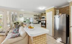  Unit 4/44 Gwenyfred Rd Kensington WA 6151 $799,000 Lee Smith & Bourkes proudly present 4/44 Gwenyfred Rd, Kensington – a spacious and delightful 3-bedroom, 2-bathroom single-story villa nestled in a boutique group of just four homes. Positioned privately at the rear of the complex, this home offers peace and tranquillity. The property also boasts two parking bays, perfect for those with a caravan or boat. Built in 1993, this villa offers a generous 146m² of home, sitting on an exclusive-use land area of 281m². The home features three well-sized bedrooms, including a spacious master suite with a walk-in robe and ensuite bathroom. There is also a second living area in addition to the main open-plan living and dining space, providing ample room for relaxation and entertaining. The home’s generous covered alfresco area offers the perfect setting for outdoor dining or simply enjoying the peaceful surroundings. Notably, there are no common walls with any other units in the complex, providing a sense of privacy and quiet that is often sought but rarely found. This property is ideally located for convenience and lifestyle. Public transport options are abundant, with nearby bus routes easily accessible via Canning Hwy, making commuting a breeze. For nature lovers, the Swan River is only a 600m walk away, offering picturesque views and opportunities for outdoor recreation. The vibrant Victoria Park café and restaurant strip is just 1.5 km away, providing a variety of dining and entertainment options. Additionally, the Crown Entertainment Complex is only a 5-minute drive, while Perth’s CBD is just a 6-minute drive away. Other Features Include: – Built-in robes to minor bedrooms – External storeroom for added storage – Covered carport and a second dedicated car bay – Wall-mounted dryer & custom TV cabinetry included – Pets allowed – No carpets; a stylish combination of ceramic tiles and timber-look vinyl flooring throughout – Ducted evaporative air conditioning system, along with multiple ceiling fans – Rent appraised at up to $750/week – Owner-occupied, ready for you to move in at settlement 