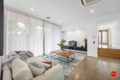 2 Rheola Drive White Hills VIC 3550 $795,000 - $850,000 Welcome to 2 Rheola Road, White Hills - an HIA award winning home that combines modern luxury with effortless family living. This stunning ex-Sandhurst display home, which won Best Display Home, presents the perfect opportunity to upsize into a stylish, low-maintenance property, offering everything you need to live stylishly in modern surrounds. Located just 5 minutes from the Bendigo CBD and a short 4-minute drive to the beautiful Bendigo Botanic Gardens, you're positioned in a prime location that provides both convenience and tranquility. Whether you're commuting, shopping, or enjoying a leisurely afternoon in the gardens, everything is at your doorstep. Entering onto spectacular polished concrete floors, the entry leads you to the aesthetic heart of the home with 3m high soaring ceilings. The contemporary matte black kitchen is a standout with its sleek 900mm appliances, built in appliance cupboard, standalone double pantry, 40mm stone benchtops and feature stone splashback. An impressive extra walk-in pantry fitted out with custom joinery and matching stone tops gives the kitchen a superb prep space. The 3.0-meter-high ceilings through the main living areas of the house elevate the sense of space and openness, giving the entertaining spaces, rear bedrooms and bathroom a soaring sense of grandeur and natural light pours in through the triple skylights above. The master suite is nothing short of luxurious, with luxury carpets, a crafted joiner-built walk in robe and generous ensuite featuring his and her basins and his and her open showers. A freestanding bath is ideal for relaxing after a long day. For added versatility, the home features a second lounge room, ideal for a kids' playroom or a quiet retreat for the adults. Throughout the home, you'll find expansive storage solutions, keeping your space organised and clutter-free. Ducted gas heating and cassette cooling ensure year-round comfort, no matter the season. The stunning main bathroom, with its opulent circular tub and floor-to-ceiling tiles, adds a touch of elegance to this already exquisite home. The laundry features abundant built-in joinery, whilst bedrooms 2, 3, and 4 are all spacious and equipped with built-in robes, all punctuated by those amazing 3m high ceilings. The north facing alfresco features a beautiful merbau deck and the garden is fully established and low maintenance, with auto irrigation and artificial turf allowing you to sit back and simply enjoy the stunning landscaping. The garage is currently converted to a rumpus room/office space with private WC, a great addition if you wish to work from home or need that extra living area. Or if preferred, the seller will swap out the large glass sliding door for a garage door at no cost. There is rear street access available if you'd prefer to park directly in the back yard. With its blend of architectural design, spacious living areas, and premium features, this home is the perfect place to create lasting memories with your family. Whether you're relaxing at home or exploring all that Bendigo has to offer, 2 Rheola Drive is the ideal setting for your new lifestyle. 