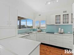  10 Penang St Point Clare NSW 2250 $1,240,000 - $1,280,000 Offered to the market for the first time in 60 years, this beautiful mid-century style home is a rare gem. Lovingly maintained by the same family, its retro appeal and incredible views makes it a ready-to-move-in opportunity for its new owners. Expansive windows throughout the home flood the interior with natural light, while showcasing breathtaking water views that stretch from Lion Island and Point Frederick to the Gosford waterfront and city skyline — creating a captivating outlook both day and night. Set on a generous 1,012sqm block in one of Point Clare’s most sought-after streets, with a national park as its backyard, this home is an exceptional find. Perfect for commuters who want to be a short walk from a train station or need a quick exit to the freeway. Located close to excellent schools, hospitals and important amenities, do not miss your chance to secure this remarkable piece of real estate. Features to Note: • Thoughtfully positioned front veranda and two rear entertaining areas maximize the stunning aspect and ensure privacy. • The terraced backyard provides a functional and safe space for children. • Secure fencing makes the backyard ideal for furry friends. • Three upstairs bedrooms, with floor-to-ceiling wardrobes; two of the bedrooms have plantation shutters and water views. • The main bathroom includes a shower, toilet, feature timber vanity, and plantation shutters. • Downstairs there is a 4th bedroom, a second bathroom with a shower, toilet, and vanity, plus a large living area—perfect for a teenage retreat, parent’s getaway, or extended family accommodation. This area can be divided from the upper floor to create a separate living space with a kitchenette and its own entry. • Expansive formal lounge with air conditioning and large feature windows with some of the best views on the Central Coast. • Formal and informal dining options. • Well-equipped kitchen featuring a Miele dishwasher, electric cooktop, Bosch oven, rangehood, plantation shutters, and ample storage space. • Single garage with an automatic roller door, plus extra space for a workshop and under-house storage. • Original timber flooring throughout the upper level, with new carpet on the lower level. • This home has a level front garden, 9kw solar system and has been freshly painted internally and externally. Convenient Distances: • Point Clare Train Station – approx. 700m • Brisbane Waters Waterfront – approx. 1.1km • Point Clare Primary School – approx. 350m • Point Clare Medical Centre & Chemist – approx. 640m • Point Clare Aldi – approx. 700m • Point Clare Shopping Precinct – approx. 740m • West Gosford Shopping Precinct – approx. 2.4km • National Park Walking Trails – approx. 150m • M1 Pacific Motorway – approx. 7km 
