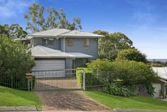  30 Killara Street Currumbin Waters QLD 4223 $1,790,000  Perched high among the gum trees with sweeping views over the iconic surf beaches of the Southern Gold Coast, this laidback yet luxurious treehouse retreat is truly a rare find. Set on an expansive 1969m² elevated block in a tightly held street, this north-facing family haven perfectly blends bushland serenity with coastal living. Just minutes from the world-renowned Currumbin Alley surf beach, it offers the ultimate lifestyle balance. Brimming with warmth and character, this light-filled, three-level home features four spacious bedrooms and two bathrooms — one showcasing a stunning freestanding bath with breathtaking ocean views. Timeless hardwood timber floors and bifold doors enhance the natural charm, while the open-plan design and seamless indoor-outdoor flow make it an entertainer's dream, perfect for gatherings in any season. A timber staircase leads to a private inground pool and covered poolside cabana, where you can relax and soak up the Gold Coast's famous sub-tropical climate. In summer, enjoy cool sea breezes from the expansive wraparound balcony, and in winter, unwind by the cozy wood-burning fireplace in the sunken living room — an ideal spot to curl up with a book or glass of wine. Although this home feels like a secluded hinterland oasis, it's just minutes from beautiful beaches, The Pines Elanora Shopping Centre, local schools, Currumbin Wildlife Sanctuary, and natural attractions such as Currumbin Rock Pools and Currumbin Creek. Property Features: Four bedrooms, two bathrooms, plus a powder room Spacious, custom-designed kitchen with island bench and stainless-steel appliances Polished hardwood timber flooring throughout Private inground pool surrounded by lush native gardens Expansive undercover wraparound balcony Cozy sunken living room with wood-burning fireplace Remote double lock-up garage Large internal laundry Multiple entertaining spaces Fully fenced front yard Prime location minutes to beaches, schools, shops, and natural attractions This stunning, one-of-a-kind sanctuary is being offered to the market for the first time — a unique opportunity to secure your very own slice of paradise and embrace the barefoot luxury lifestyle. 