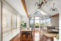  1/33 Williams Street Frankston VIC 3199 $860,000 - $935,000 Nestled in a highly desirable parkside setting mere moments from the Frankston Foreshore and the tranquil George Pentland Gardens, this elegant townhouse features captivating bay views towards Melbourne CBD, and embodies a peaceful, low-maintenance lifestyle. Positioned at the front of an exclusive complex of only four homes and no active body corporate, the three-bedroom design offers a charming living experience, characterised by a bright, north-facing social domain, multiple outdoor entertaining spaces, two off-street parking spots, and the convenience of a secure bay for your caravan or trailer. Soaring pitched ceilings and ample glazing pair well to provide a beautiful glow across a central living and dining area, bay-facing covered balcony, and a well-appointed kitchen with dishwasher, walk-in pantry and modern appliances. Above, the master bedroom provides a retreat for couples with their own spa-ensuite and robes, while two light-filled bedrooms, a main bathroom with separate toilet, laundry and direct garage access, settle below. Split-system heating and cooling complements both gas ducted heating and automated exterior blinds, before new carpet and fresh paint, timber accents, an alarm system, vertical safe, ample storage throughout including under-house, low-maintenance front gardens and rear vehicle access, further appeal. Enjoy the convenience of Frankston Hospital, Frankston's CBD and Train Station, and Kinetic Stadium all within easy strolling distance of home. 