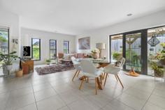  1/428 McClelland Drive Langwarrin VIC 3910 $699,000 - $749,000 Stacked with high-end finishes, clever storage, and a layout that just makes sense, this modern 3-bedroom townhouse delivers a home that's sleek, stylish, and straight-up effortless. A smart and effortless design that works for living easily has been crafted for maximum flow between indoors and out, ready for lively entertaining, kicking back, or just living your best life. Its open-plan living and dining zone is finished with large-format tiles and equally impressive natural light, filtering golden rays inside while peering out over its covered terrace and yard. The kitchen is a showstopper with warming tones and sleek stone benchtops surrounding stainless steel appliances, stepping outside to a private covered patio ready for morning coffees, sunset drinks, or lazing away. Three generous bedrooms include a downstairs master with a full ensuite and walk-through robe, with individual split-system comforts, a central bathroom and a separate toilet serving the upper level. Comfort is covered year-round with central heating and split-system air conditioning, while the remote double garage stores the wheels. Its location is near-unbeatable, just minutes from Karingal Hub, Mornington Peninsula Freeway, Karingal Heights Primary, McClelland College, and public transport, putting everything you need right at your fingertips. Whether you're a first-home buyer, a savvy investor, or looking to downsize without compromise, this one ticks every single box.  