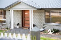  10 Maisie Rd Emerald VIC 3782 $1,050,000 - $1,150,000 Behind a White Picket Fence …. Nestled at the end of a quiet, no-through road, 10 Maisie Road, Emerald offers the perfect balance of modern living and serene surroundings. This beautifully renovated 4-bedroom, 2-bathroom home sits on a sprawling 6,295m² of land, blending open space, a secure backyard, and natural bushland to create a peaceful retreat just moments from Emerald’s charming township. Step inside to discover a thoughtfully designed home with two generous living areas—one ideal as a kids’ playroom or private retreat, complete with its own powder room. The stylish kitchen is a chef’s dream, boasting a butler’s pantry, ample storage, and quality appliances. Each bedroom is generously sized, with the master suite featuring a walk-in robe and ensuite for ultimate comfort. Designed for seamless indoor-outdoor living, the deck overlooks the lush backyard, providing the perfect spot for entertaining or simply unwinding in nature. The property’s two driveways offer convenience and versatility—one leading to a double car shed, while the other provides easy access to the side and rear of the home. If you’ve been searching for a family-friendly sanctuary with space, style, and convenience, this is it. Walking distance to Emerald township, yet tucked away in a peaceful setting, this home is a rare find. 