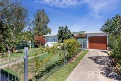  7 Tumut Plains Road Tumut NSW 2720 $445,000 Positioned on a generous corner allotment amongst landscaped grounds and just a short stroll from Tumut's major sporting fields and local amenities, sits this well-maintained, sun-filtered family home. Boasting three great sized bedrooms, open plan kitchen and dining, living area serviced by reverse cycle air conditioning and wood box fire heating for year-round comfort and a large sunroom positioned to the front of the plan. You will love this well maintained, sun filtered gem. Do not miss your opportunity to secure such a fantastic opportunity, call today to book your inspection! Premiere Features: - Three great sized bedrooms, master bedroom boasting built-in robes, split system air conditioning and ceiling fan - Oversized sun filtered bathroom with single vanity, toilet, separate shower, built-in shelving and wall mounted heater - Open plan eat in style kitchen with double sink, ample storage and bench space, electric cooktop and direct external access - Centrally located living area with brick feature wall, serviced by reverse cycle air conditioning and wood box fire heating - Large sunroom upon entry - Internal laundry with direct rear yard access - Linen in hall - Additional external toilet - Quaint covered front deck - Fully fenced manicured front and rear yard - Single lock up garage - Additional shed with lighting and power - Large rainwater tank used to service the gardens - External blinds on all windows - Approximate 645m² allotment 