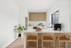  3/18 Phillips Avenue West Wollongong NSW 2500 $1,095,000 Embrace a carefree, suburban lifestyle with these meticulously crafted town homes located in the heart of Wollongong. A great place to put down roots, each offering three well-proportioned bedrooms including a spacious main with an ensuite and walk-in wardrobe, a tastefully-designed kitchen with stone benchtops + a walk-in pantry, a double lock-up garage and a peaceful courtyard, where you can enjoy a morning cuppa or simply take a well-deserved time out from the hustle and bustle of the day. Providing a neutral canvas for you to make the space your own, this light-filled residence offers families of all ages and stages the opportunity to be the first to call this delightful town house a home. Features • High ceilings throughout main living areas • Ducted reverse-cycle A/C upstairs and down • Three toilets, 1 downstairs and 2 upstairs • Large bedrooms with built in robes - ensuite off main • Second sitting room upstairs, under stair storage • Situated in a lush cul-de-sac, moments to the CBD 