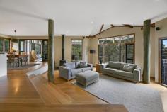  30 Killara Street Currumbin Waters QLD 4223 $1,790,000  Perched high among the gum trees with sweeping views over the iconic surf beaches of the Southern Gold Coast, this laidback yet luxurious treehouse retreat is truly a rare find. Set on an expansive 1969m² elevated block in a tightly held street, this north-facing family haven perfectly blends bushland serenity with coastal living. Just minutes from the world-renowned Currumbin Alley surf beach, it offers the ultimate lifestyle balance. Brimming with warmth and character, this light-filled, three-level home features four spacious bedrooms and two bathrooms — one showcasing a stunning freestanding bath with breathtaking ocean views. Timeless hardwood timber floors and bifold doors enhance the natural charm, while the open-plan design and seamless indoor-outdoor flow make it an entertainer's dream, perfect for gatherings in any season. A timber staircase leads to a private inground pool and covered poolside cabana, where you can relax and soak up the Gold Coast's famous sub-tropical climate. In summer, enjoy cool sea breezes from the expansive wraparound balcony, and in winter, unwind by the cozy wood-burning fireplace in the sunken living room — an ideal spot to curl up with a book or glass of wine. Although this home feels like a secluded hinterland oasis, it's just minutes from beautiful beaches, The Pines Elanora Shopping Centre, local schools, Currumbin Wildlife Sanctuary, and natural attractions such as Currumbin Rock Pools and Currumbin Creek. Property Features: Four bedrooms, two bathrooms, plus a powder room Spacious, custom-designed kitchen with island bench and stainless-steel appliances Polished hardwood timber flooring throughout Private inground pool surrounded by lush native gardens Expansive undercover wraparound balcony Cozy sunken living room with wood-burning fireplace Remote double lock-up garage Large internal laundry Multiple entertaining spaces Fully fenced front yard Prime location minutes to beaches, schools, shops, and natural attractions This stunning, one-of-a-kind sanctuary is being offered to the market for the first time — a unique opportunity to secure your very own slice of paradise and embrace the barefoot luxury lifestyle. 