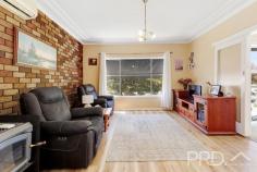  7 Tumut Plains Road Tumut NSW 2720 $445,000 Positioned on a generous corner allotment amongst landscaped grounds and just a short stroll from Tumut's major sporting fields and local amenities, sits this well-maintained, sun-filtered family home. Boasting three great sized bedrooms, open plan kitchen and dining, living area serviced by reverse cycle air conditioning and wood box fire heating for year-round comfort and a large sunroom positioned to the front of the plan. You will love this well maintained, sun filtered gem. Do not miss your opportunity to secure such a fantastic opportunity, call today to book your inspection! Premiere Features: - Three great sized bedrooms, master bedroom boasting built-in robes, split system air conditioning and ceiling fan - Oversized sun filtered bathroom with single vanity, toilet, separate shower, built-in shelving and wall mounted heater - Open plan eat in style kitchen with double sink, ample storage and bench space, electric cooktop and direct external access - Centrally located living area with brick feature wall, serviced by reverse cycle air conditioning and wood box fire heating - Large sunroom upon entry - Internal laundry with direct rear yard access - Linen in hall - Additional external toilet - Quaint covered front deck - Fully fenced manicured front and rear yard - Single lock up garage - Additional shed with lighting and power - Large rainwater tank used to service the gardens - External blinds on all windows - Approximate 645m² allotment 