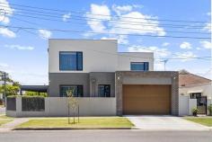  83 Garden Street Maroubra NSW 2035 Designer lifestyle for ultimate family flexibility and easy care entertaining. This expansive contemporary residence offers space, style and quality in this convenient location just footsteps to Maroubra Junction shopping, schools & City bus and 2km to Maroubra Beach. Set over two levels, the approx. 375sqm floorplan encompasses up to 6 bedrooms plus studies and generous formal & casual living flowing to al fresco entertaining. Built to the highest standards with premium fixtures & finishes, ducted air-conditioning, lift and security, it's the perfect forever home for families of all ages. · Distinctive 2021 residence on 360sqm corner block · Formal & casual living plus multi-purpose rooms · Entertainer's kitchen with Gaggenau appliances · Stone benchtops & breakfast bar, walk-in pantry · Sophisticated designer décor, tiled & timber floors · 5 double bedrooms - 4 with en-suites · 3 study/media rooms - piano room with acoustics · King sized master suite, ground floor guest suite · Luxe fully-tiled bathrooms with under floor heating & towel rails · Shower equipped with a water filter to protect · Equipped with underfloor heating in kitchen/dining areas and a designer fireplace · All external & internal walls are fitted with sound screen insulation · All en-suite bathrooms include smart toilets, underfloor heating, heated towel racks, exhaust fans, and LED heat lamps · Alarm & security cameras, Crimsafe fly screens throughout · Sustainable design, solar power and rainwater tanks · Wraparound terraces, al fresco dining, double garage with solar battery charger · 500m to Pacific Square shops, dining and City buses · Maroubra Junction Public School, French School & Mount Sinai Primary · Minutes drive to Maroubra Beach, International Airport and UNSW and Price of Wales Hospital 