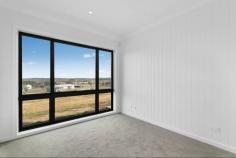  101 Lute Street Gundaroo NSW 2620 $1,550,000 - $1,650,000 Discover the perfect blend of modern elegance and timeless charm at this exquisite brand new 4 bedroom plus study residence located in Gundaroo's heights with expansive views over the village and surrounding region. This architectural masterpiece is designed to impress with its thoughtful layout and stylish finishes, making it an ideal family home or a sophisticated retreat for those seeking to work from home. The position is supreme sited at the top of Kyeema Estate on a hard to find 2.46acre (9963sqm) block. This allows plenty of extra space for shedding, boats and caravans or build the Taj Mahal of chook pens and have the chickens free-range across the block. The block is a blank canvass with excellent scope to create the edible gardens and orchards you've always dreamed of. Key Highlights: - Brand New Build: Completed in 2024. Custom built and never lived in. - Spacious Living: With four generously sized bedrooms, this home offers ample space for the family to have their own space and come together in the heart of the home in the open plan kitchen and meals areas. The master bedroom is particularly big and features a decadent en-suite bathroom and barn slider to the walk-in robe while a separate study provides extra flexibility as a 5th/guest bedroom. - Architectural Design: This home boasts stunning architectural elements, including an exterior comprised of red brick features, light grey render and monument coloured vertical cladding. With its high set ceilings, skylights and elegant double glazed black feature windows the interiors are flooded with natural light, seamlessly connecting indoor and outdoor spaces. - Stylish Interiors: The interior design reflects a harmonious blend of industrial chic and functional living, with high-end finishes throughout. Clean lines are accentuated by black door/tap hardware, hybrid flooring, feature panelling, and an abundance of joinery and feature lighting, some of which are sensor operated for ease. - Elegant Bathrooms: Enjoy the luxury of two beautifully designed bathrooms, complete with modern fixtures and finishes that elevate your daily routine. Under-tile heating adds an extra indulgence for the winter months. - Must Haves: Double glazed windows throughout, zoned ducted air-conditioning system, induction cooktop, stone benchtops and butlers pantry to kitchen, 50 point data cabling to communications rack in garage, mud room for extra storage, surround sound cabling to media room, ceiling fans throughout. A generous 107000 Litre rain water tank capacity. - Outdoor Oasis: The North Easterly orientation provides for a sheltered alfresco entertaining space which captures the cool summer Easterly's while a second SW facing entertaining deck is the perfect spot to finish the days end watching the sun set over the village and hills beyond. - Double Garage: A deep 7.5m x 7m double garage is a welcome addition with cabling in place to fit 2 EV car chargers (2 x separate 32A three-phase sub-circuits have been installed on either side of the garage) and extra shelving to the rear. - Space for expansion: A 14m x 14m site cut is in place for a future shed or tennis court with 3-phase power and communications cabling provisioned to a switchboard. - Prime Location: Situated a short walk in to the charming village of Gundaroo, with its Primary School, eateries, shop and park, makes this an ideal choice for families and professionals alike. School busses depart to Canberra's major schools for the older kids. Don't miss this opportunity to own a one-of-a-kind property that combines architectural elegance with modern convenience. Avoid the stress of building, just the landscaping to get underway and plenty of space to go around. 