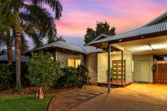  5 Dunnart Crescent Djugun WA 6725 $890,000 Located on one of Roebuck Estate's most sought-after streets, this stunning 4 bed, 2 bath home offers the perfect blend of space and style. Family-sized and feature-packed, the home delivers a modern, low-maintenance lifestyle and a seamless blend of indoor and outdoor living, perfect for the Broome way of life. From the outside, if the lush manicured lawns and mature tropical gardens don't grab your attention, the space and storage certainly will. The large double carport has room for two vehicles with lock-up rear storeroom and gated side access to the rear for secure boat, trailer or caravan parking. Light, bright and tiled throughout, the stylish interior boasts spacious open-plan living and dining with neutral colours and plenty of natural light flowing through. The big modern kitchen is guaranteed to impress, complete with engineered stone countertops, white gloss cabinetry, stainless steel appliances, walk-in corner pantry and big breakfast bar. Other stunning features include the large main bathroom with separate shower and bath, big laundry with built-in linen cupboard, separate W/C, modern downlights, air-conditioning, ceiling fans, window blinds, plenty of storage and more! The home itself has 4 large bedrooms, all with mirrored built-in robes, air-con and ceiling fans, including the stunning front Master retreat, which boasts big walk-in robe and private ensuite with dual vanity. Maximising indoor/outdoor living, glass sliding doors from the living/dining area open onto the expansive decked outdoor alfresco area with black ceiling fans, ideal for entertaining. The fully shaded below-ground pool is sure to be a family favourite, while the beautifully manicured tropical gardens offer plenty of lush green grass for the kids and pets to play. Located in a quiet street and close to parks, shops and schools, you'll be hard pressed to find a better home and lifestyle package for your family. 