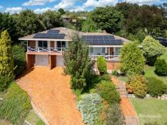  7 Merino Terrace Armidale NSW 2350 $635,000 - $660,000 Welcome to your dream home! This exquisite multi-level residence offers the perfect blend of space, comfort, and modern living. Set on a generous 1,076sqm corner block, this five-bedroom, three-bathroom home is designed for versatile family living. Inside, you’ll find a thoughtfully designed layout with four bedrooms featuring built-in wardrobes, while the master suite boasts a luxurious en-suite. The fifth bedroom, located downstairs with its own bathroom and separate space, is ideal for a teenager’s retreat, guest accommodation, or even a private home office. The heart of the home is the spacious kitchen, complete with modern appliances and an adjoining dining area warmed by a charming wood fireplace. A carpeted living room provides a cozy retreat, while the fully enclosed outdoor area is perfect for year-round entertaining. Outside, the tiered garden beds, established trees, and multiple patio and balcony spaces create a serene setting for relaxation. The double lock-up garage and ample storage cater to practical needs, and solar panels add energy efficiency to the home. Situated in a sought-after location, this home is a rare find, offering a combination of space, style, and functionality. Don’t miss your chance to secure this stunning family haven! 