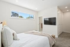  49B Cabbage Tree Lane Fairy Meadow NSW 2519 $1,450,000 Embrace a carefree, suburban lifestyle with this Hamptons-style Torrens Title duplex built just 18 months ago. A great place to put down roots, it offers four bedrooms complete with built-in-wardrobes, a tastefully-designed, gas-equipped kitchen with stone bench tops, a main bathroom with a spacious bathtub, ducted air conditioning and a free-flowing open plan that creates a harmonious relationship between indoor and outdoor living. The neutral palette provides the perfect canvas to make the space your own, while the fully fenced backyard offers privacy and tranquility, and entertainers balcony with breathtaking escarpment views. Positioned on an elevated block, this modern residence is just a level stroll to local schools, shops, cafes, and all the best that Fairy Meadow has to offer. Torrens title duplex, lock-up garage High ceilings, ducted a/c, private yard Entertainers balcony off living/dining Escarpment views, modern interiors Easy stroll to every day conveniences 
