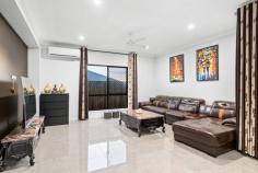  118 Danbulla Street South Ripley QLD 4306 $1,100,000 Essential Details at a Glance: 289m² Home on a 312m² Block 4 Bed, 3 Bath, 2 Car 3 Living Areas Near New, Built in 2024 by 'Home By CMA' Providence Estate Currently Owner Occupied Council Rates: $599/quarter Rental Appraisal: $840-$860/week This stunning, near-new double-storey home, built in 2024, boasts a custom design tailored for modern living. Featuring four spacious bedrooms, three beautifully appointed bathrooms, and three versatile living areas, this residence offers both style and functionality. The well-appointed kitchen is a chef's dream, complete with ample storage, a walk-in pantry and high-end finishes. Designed for low-maintenance living, the outdoor space is perfect for busy professionals seeking a hassle-free lifestyle. With its contemporary elegance and thoughtful design, this home is an exceptional opportunity for those looking to enjoy comfort and convenience in a premium setting. Architectural & Structural Features: Near-new, custom-designed double-storey home (near new - built in 2024) Steel frame construction for durability and longevity Upgraded ceiling heights: 2.7m downstairs, 2.6m upstairs Luxurious timber staircase with glass wall railing Bedrooms & Bathrooms: Four spacious bedrooms with built-ins, fans, custom-made curtains, and two with air-conditioning Generous master bedroom with large walk-in robe, air-conditioning, and a high-end ensuite Luxurious ensuite featuring his-and-hers vanities, oversized shower, freestanding bathtub, and separate toilet Downstairs bedroom functions as a second master with its own ensuite Main bathroom with shower and toilet Additional 4th toilet in laundry Living & Entertaining Spaces: Air-conditioned open-plan kitchen, living, and dining areas with upgraded 600x600 porcelain tiles Second living area: Family/media room Third living area: Kid's retreat/rumpus room upstairs, with beautiful views of Flinders Peak in the distance Oversized alfresco and outdoor entertaining area Kitchen & Laundry Spacious and well-appointed kitchen with: Stone bench tops and feature pendant lighting 5-burner gas cooktop and large oven Dishwasher and double fridge space Two sinks and a walk-in pantry Separate laundry with external access Outdoor & Additional Features: Low/no maintenance yard with astroturf and pebbles in place Excellent views across to Flinders Peak from the second storey Security screens throughout the lower level and master bedroom NBN connection for high-speed internet Mains gas connection Three-phase power connection Location*: Zoned for Ripley Valley State School (Primary - 3 Minutes) Zoned for Ripley Valley State Secondary College (Secondary - 3 Minutes) 2 Minutes Walk to Mirrigin Park 6 Minutes to Ripley Town Centre Shopping (Coles) 17 Minutes to Springfield Train Station 21 Minutes to Ipswich CBD 20 Minutes to RAAF Amberley 45 Minutes to Brisbane CBD Flood-Free Area Easy access to Cunningham and Centenary Highways 