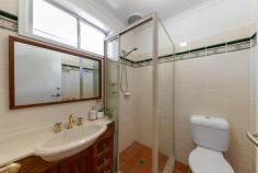  18 Woralul Street Waramanga ACT 2611 The charm and style of this 3 bedroom ensuite home on a large block cannot be overstated. A perfect home for a young family, downsizers, investors or extenders alike. Walk up to this lovingly well kept home surrounded by Australian flora, and you'll be struck by the long driveway and private front garden. Step inside and you'll be drawn to the solid Ash timber hardwood floors, leafy aspects, bright white walls, and wooden architraves which instil a sense of warmth and freshness. To the right, you're met with the elevated living spaces. Up the steps is the open plan dining room and charming kitchen, with its rich wooden cabinetry, island countertop, blue detailing, and adorable painted tiling in the backsplash. This heart of the home is where everyday family memories are made. Perfect for hosting together, or relaxing alone. Continue through the home, and you'll be met with a spacious living room. Well lit, airconditioned, and including the same polished wooden floorboards you'll find throughout the house. Slide open the floor to ceiling glass doors to bring the outside in, access the covered patio and let the house breathe the summer breeze. This patio is shady, airy, and expansive, all opening onto the large green back garden surrounded by planters and potential. You'll imagine long summer evenings with good wine and great conversation. To the left… make your way down the hall where you'll be welcomed by the bedrooms. Each has its own personality, with large windows and leafy aspects. The generous master boasts a walk-through wardrobe to keep your clothes and treasures tucked away. The ensuite bathroom is spacious and light, with retro wood and gold detailing. Tree-lined Waramanga is known for its peace, quiet and friendly community. It's the perfect place to provide an idyllic childhood or relaxing retirement. Close to public and private schools, Waramanga shops, Cooleman Court, Woden town centre, public transport and Mount Arawang's walking trails, the location perfectly balances city and nature. YOUR NEW HOME FEATURES Sunlit 3 bedroom ensuite home on large block Living room with timber glass sliding doors which flow out to the alfresco Renovated kitchen with gas cooktop, electric oven and dishwasher Master bedroom with walk in robe and ensuite Renovated main bathroom with bath Separate toilet Separate laundry with garden access Polished solid Ash timber hardwood floors and new blinds throughout Reverse cycle split system heating and cooling Established front and back gardens with Australian natives and other exotic species Large, secure and low maintenance back garden Double carport with storage shed Long private driveway and plenty of off street parking Walking distance to Waramanga shops and Cooleman Court Close to popular schools, public transport, Westfield Woden and major arterial roads to all areas of the city STATISTICS (all figures are approximate) EER: 0 Home Size: 110.55 sqm Carport: 44.16 sqm Land Size: 845 sqm Land Value: $591,000 (2024) Rates: $3,605 per annum Land Tax: $6,325 per annum (Investors only) Construction: 1970 