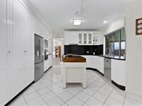  32 Shiral Drive BEACONSFIELD QLD 4740 Nestled in a sought-after pocket of Beaconsfield, 32 Shiral Drive offers the perfect combination of comfort, space, and convenience. This beautifully presented four-bedroom home, complete with a separate office, is ideal for families looking for a functional yet stylish residence. Step inside and be greeted by a spacious lounge room, perfect for relaxing or entertaining guests. The heart of the home is the stunning kitchen, boasting an abundance of storage and expansive bench space, seamlessly flowing into the large dining area. This open-plan space extends effortlessly onto the covered patio, creating the perfect setting for alfresco dining while overlooking the fully fenced backyard. The master suite is a private retreat, featuring a walk-in robe and a stylish ensuite. Each of the remaining three bedrooms is well-appointed, offering built-in robes, ceiling fans, and air conditioning for year-round comfort. A modern family bathroom services these rooms, ensuring practicality for the whole household. Outside, the landscaped backyard is complemented by an established garden and a powered single-bay shed, ideal for tool storage or weekend projects. Parking is a breeze with a double garage and an additional carport, providing ample space for vehicles. Positioned on an elevated block, this home is conveniently located close to schools, shops, and the golf course, with the Mackay CBD just a short drive away. With a perfect blend of modern living and practical design, 32 Shiral Drive is a home that ticks all the boxes. Don't miss your opportunity-enquire today! 