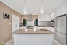  8-12 Cohen Close Gordonvale QLD 4865 $879,000 Therese Plath says "are you dreaming of the perfect family home that combines space, comfort, and functionality? Look no further! This lifestyle property, set on a sprawling 2,058m2 block, offers everything you need and more. This location in a quiet close offers the perfect blend of tranquility and convenience. Just a 25-minute drive from Cairns City and a mere 5 minutes from schools, shopping centers, and sporting facilities, everything you need is within easy reach. Features you'll love: • Four Bedrooms: Generously sized to accommodate the whole family, each room offers comfort and privacy. The master has en-suite and walk in robe • Renovated kitchen: Renovated just four years ago, the kitchen boasts a walk-in pantry, a gas double oven, one and a half sinks, a spacious area for a large fridge, and ample cupboards and drawers. Complemented by stone benchtops and a dishwasher, it seamlessly combines style and functionality. • Living Areas: Open plan, tiled living and dining opens onto massive, enclosed patio big enough to entertain friends and family • Outdoor Oasis: Step outside to a large backyard featuring a sparkling swimming pool, ideal for those warm summer days. • Sheds & Carport: The property includes a fully fenced 8m x 8m carport with power and an additional powered tool shed-plenty of space for vehicles, tools, and hobbies. • Asphalt Driveway: A smooth and durable driveway leads to your new home, offering both convenience and curb appeal. • Generator Ready: The home is fully wired for generator power, ensuring you're prepared for any situation. • Chook Pen: A dedicated chicken pen provides the opportunity to enjoy fresh eggs daily while adding a touch of rural charm. • Additional Features: Fully air conditioned, security screened, internal laundry, linen cupboard and fully fenced This property truly offers the best of both worlds-spacious living with modern amenities, all nestled within a private setting. Don't miss your chance to own this slice of paradise! 