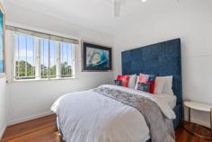  33 Olive Grove Balmoral QLD 4171 Introducing this rare opportunity to secure Balmoral's best value, post war home, in the lifestyle precinct of 4171, within walking distance to the coveted Oxford Street café and dining precinct as well as Bulimba State School. Situated on a high and dry 491m² allotment with current city glimpses and the potential for sweeping city views if developed. This charming home is in immaculate condition, offering buyers the perfect property to buy now and build later. In more than perfect livable condition, this is a rare opportunity that provides a great investment or future-proof entry into 4171. With beautiful and established gardens that greet you from the street, this property is ready to go and provides the perfect space to relax and unwind in our busy modern lives-your very own inner-city oasis. Street appeal at its very best, perched high, the home invites you in with its manicured gardens and lawns-the hard work has already been done. Offering a secure garage and side access for additional vehicles or "toys" to be stored off-street, it also provides concrete access to the backyard. Walk up the front steps and onto the front north-facing deck, a focal point of the home, offering incredible sweeping vistas of the lush treetops of Balmoral-the perfect space for morning coffee. Enter into the open-plan living area, which connects seamlessly to the modern renovated kitchen. Light floods this area, creating an open and airy feeling throughout. Freshly painted, the home also features three generously sized bedrooms, with built-in robes. The master bedroom offers the same stunning outlook as the front deck and living room. A large, well-appointed bathroom with a double basin is well-positioned, providing great airflow and light. Hardwood flooring ensures easy and cool living throughout the summer months and minimizes ongoing maintenance. A separate laundry with an additional powder room is conveniently located with easy access to the backyard. Lush gardens continue in the backyard, with an immaculate lawn framed by garden beds that create a wonderful green sanctuary, completed with a garden shed providing ample storage for those who enjoy the outdoors. Additional features include: Large concreted storage area located under the house Air conditioning and ceiling fans Incredible breezes Flood-free Opportunity to develop this post-war home (STCA) Don't miss this opportunity to landbank and plan for the future-the ideal option for those who want to secure their space in the highly sought-after 4171. Move in, do nothing, and watch your investment grow, with endless options for the future. 