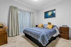  8 Regency Parade Mildura VIC 3500 $690,000 - $759,000 Damian Portaro, Principal & Chairman's Elite Sales Agent and Katrina Wootton, Sales Agent & Marketing Specialist at Ray White Mildura, is proud to present 8 Regency Parade-a spacious and immaculately maintained family home that combines modern updates with timeless charm, all set in a sought-after Mildura location. Nestled on a generous 1,002sqm allotment, this beautifully presented four-bedroom home offers an exceptional lifestyle opportunity. The master bedroom features a walk-in robe and ensuite, while the additional three bedrooms, all with built-in robes, provide ample space for the family. Step into the welcoming entrance hall with slate flooring, freshly painted interiors, and discover a layout designed for both comfort and practicality. The heart of the home is the central timber kitchen, equipped with updated appliances and an open-plan design that flows seamlessly into the meals and living area. A formal dining room and separate lounge provide versatile spaces for relaxation and entertaining. Year-round comfort is ensured with ducted evaporative cooling and gas log heating, while the vine-covered outdoor area invites you to enjoy the Mildura climate in style. The property boasts stunning gardens with walking paths, a veggie garden, and an expansive 6m x 6m shed with a mezzanine for extra storage. The double garage provides secure parking, and the location puts you within easy reach of shopping, schools, parks, and other essential amenities. 8 Regency Parade is more than a home; it's an opportunity to embrace a lifestyle of comfort, convenience, and charm. 