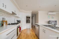  14 Dale Crescent Armidale NSW 2350 $500,000 - $550,000 Modern and low-maintenance, this four-bedroom home is an ideal investment opportunity, currently tenanted and beautifully presented. Each bedroom is equipped with built-in wardrobes, while the master suite boasts a walk-in robe and private ensuite. The heart of the home is the open-plan living and kitchen area, featuring light floating floors, reverse cycle air conditioning, and a kitchen with an island bench, two ovens and corner pantry for added convenience. The main bathroom offers a contemporary design, complete with a floating vanity, dark tiling, a deep bathtub, a shower, and a separate toilet. The property also includes a double lock-up garage with internal access, along with a neat, easy-care backyard. The outdoor space is enhanced by a garden shed and an undercover entertaining area—perfect for relaxing or hosting guests. A well-rounded property ready for investors seeking style and comfort in a sought-after location. 