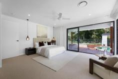 457 Tallebudgera Creek Road Tallebudgera Valley QLD 4228 $5,999,000 Welcome to "Willow Park," an extraordinary private sanctuary where contemporary luxury meets serene natural beauty. Nestled on an expansive and level 1.86-acre estate with direct frontage to the picturesque Tallebudgera Creek, this newly built residence is a masterpiece of modern design, offering a lifestyle of unparalleled tranquillity and sophistication. From the moment you arrive, an oversized glass entryway framed by a striking stone feature wall and elegant chandelier sets the tone for the grandeur that lies within. Beyond the welcoming foyer, the heart of the home unfolds into an expansive open-plan living, dining, and kitchen area, crowned by soaring cathedral ceilings with VJ panelling. Designed to embrace natural light and breath-taking views, floor-to-ceiling windows and a dramatic stone-clad feature wall create an atmosphere of refined opulence. The gourmet kitchen, an entertainer's dream, boasts an oversized island bench, premium Electrolux appliances, a glass splashback, and an integrated dishwasher drawer. A fully equipped butler's pantry with a wine fridge, additional sink, and Miele dishwasher ensures effortless hosting. Meanwhile, five generously proportioned bedrooms, four luxurious bathrooms, and an additional powder room are thoughtfully positioned throughout the home. The master suite, a private retreat in its own wing, is an oasis of indulgence. Overlooking the pool and lush surroundings, it features a custom-designed dressing room with bespoke cabinetry, a beauty station, and an opulent ensuite complete with a freestanding bath, dual vanity, and floor-to-ceiling tiling. Three additional bedrooms include custom built-in robes, with two enjoying the convenience of modern ensuites. A versatile fifth bedroom, ideal as a home office, completes the accommodation. For those who appreciate cinematic experiences, a soundproof media room offers the perfect setting for family movie nights or immersive entertainment. Step outside into an enchanting natural wonderland, where mature trees, manicured lawns, and pristine creek frontage create a breathtaking backdrop. A vast covered timber deck, complete with an outdoor kitchen, sets the stage for unforgettable alfresco gatherings, while the resort-style pool, featuring a diving board and timber decking, invites endless enjoyment. For moments of relaxation, a spa and sun deck await, along with a charming poolside pavilion where you will find the sauna and a separate pool house with barn-style entry and powder room. As the sun sets, gather around the firepit and soak in the peaceful ambience of this unparalleled setting or move to the purpose built creek side deck overlooking the sprawling lawn. Every aspect of this home has been carefully curated for comfort and convenience. State-of-the-art inclusions such as ducted air-conditioning, LED lighting, security alarm and CCTV cameras, Wi-Fi boosters, an electric gated entrance with intercom, and a Yale security system ensure effortless modern living. Sustainable features include a 13.2kW solar system, electric hot water, and town water supply with additional pumping rights from Tallebudgera Creek. Perfectly positioned, "Willow Park" is just minutes from top-tier schools such as Tallebudgera State School and St. Andrews Lutheran College. The iconic beaches of Burleigh Heads, Palm Beach, and Currumbin are within a short drive, offering the best of coastal living, while Gold Coast Airport and Surfers Paradise are also easily accessible. This exceptional residence is a rare opportunity to secure a home of distinction in one of the most sought-after locations. All the hard work has been done—simply move in and immerse yourself in the luxury and serenity of "Willow Park." Arrange your private inspection today and experience the pinnacle of Gold Coast acreage living. - Ducted air-conditioning - LED lighting - Security alarm and CCTV cameras - Wi-Fi boosters - Electric gated entrance with intercom - Yale security system - 13.2kW solar system - Electric hot water - Town water supply with additional pumping rights from Tallebudgera Creek - Property features: - Expansive and level 1.86-acre estate with Tallebudgera Creek frontage - Newly built, architecturally designed home - Oversized glass entryway with a stone feature wall and chandelier - Open-plan living, dining, and kitchen area with cathedral ceilings - Floor-to-ceiling windows and a striking stone-clad feature wall - Gourmet kitchen with an oversized island, premium Electrolux appliances, and glass splashback - Butler's pantry with a wine fridge, sink, and Miele dishwasher - Soundproof media room for immersive entertainment - Five spacious bedrooms, including a master retreat in its own wing - Four luxurious bathrooms plus an additional powder room - Master suite with custom dressing room, beauty station, and spa-like ensuite - Covered timber deck with an outdoor kitchen - Resort-style pool with diving board and timber decking - Spa, sun deck, and poolside pavilion - Firepit area for relaxed evenings outdoors - Pool house with barn-style entry and powder room Location benefits: - Approx. 5 mins to Tallebudgera State School and local shops - Approx. 5 mins to St. Andrews Lutheran College - Approx. 11 mins to Burleigh Heads - Approx. 12 mins to Palm Beach - Approx. 14 mins to Currumbin Beach - Approx. 18 mins to Gold Coast Airport - Approx. 39 mins to Surfers Paradise 