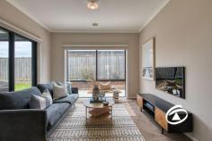  6 Camellia Dr Bunyip VIC 3815 $680,000 - $748,000 Large Scale Family Living Beautifully presented and custom-built, this spacious family home on a secure 721m² allotment offers a true move-in-ready lifestyle with nothing to spend. Designed for effortless comfort, it features two distinct living areas—a formal lounge and an open-plan living and dining space—complemented by a stylish kitchen equipped with 900mm stainless steel appliances, a dishwasher, ample bench and cupboard space, and a walk-in pantry. The home boasts four generously sized bedrooms, including an expansive master suite with a walk-in robe and a full ensuite. The remaining bedrooms are all oversized, each with a walk-in wardrobe, and are serviced by a modern family bathroom and a separate powder room. A versatile study adds flexibility, easily converting into a third living area or a functional home office. Step outside to a fantastic alfresco area, perfect for entertaining, overlooking a spacious backyard with lush, established gardens and a well-maintained lawn. Additionally, side access for extra vehicles, boats, or trailers can be conveniently achieved with the simple addition of a side gate. Ideally positioned within walking distance of Bunyip’s Main Street shops, cafés, schools, kindergarten, parks, sporting facilities, and the V-Line train station, this home seamlessly blends rural charm with modern convenience. 