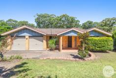  102 Wallawa Road Nelson Bay NSW 2315 Nestled on a generous 877m² block and backing onto a peaceful nature reserve, this single-level family home offers the perfect blend of space, privacy, and convenience. Tucked away in a quiet, sought-after pocket of Nelson Bay, it's an ideal retreat for families looking to enjoy a relaxed coastal lifestyle. Step inside to discover a bright and open-plan living and dining area, featuring raked ceilings that enhance the sense of space. The home boasts three well-sized bedrooms with built-in robes, including a master with an ensuite. Outside, a covered entertainment area overlooks a spacious backyard that flows seamlessly into the surrounding bushland-perfect for kids to explore, weekend barbecues, or simply unwinding in nature. All this is just moments from local schools, shops, beaches, and scenic walking trails, offering a balance of convenience and tranquility. Whether you're a growing family or looking for a peaceful escape, this home is a rare find. 
