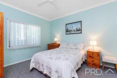  7 Tumut Plains Road Tumut NSW 2720 $445,000 Positioned on a generous corner allotment amongst landscaped grounds and just a short stroll from Tumut's major sporting fields and local amenities, sits this well-maintained, sun-filtered family home. Boasting three great sized bedrooms, open plan kitchen and dining, living area serviced by reverse cycle air conditioning and wood box fire heating for year-round comfort and a large sunroom positioned to the front of the plan. You will love this well maintained, sun filtered gem. Do not miss your opportunity to secure such a fantastic opportunity, call today to book your inspection! Premiere Features: - Three great sized bedrooms, master bedroom boasting built-in robes, split system air conditioning and ceiling fan - Oversized sun filtered bathroom with single vanity, toilet, separate shower, built-in shelving and wall mounted heater - Open plan eat in style kitchen with double sink, ample storage and bench space, electric cooktop and direct external access - Centrally located living area with brick feature wall, serviced by reverse cycle air conditioning and wood box fire heating - Large sunroom upon entry - Internal laundry with direct rear yard access - Linen in hall - Additional external toilet - Quaint covered front deck - Fully fenced manicured front and rear yard - Single lock up garage - Additional shed with lighting and power - Large rainwater tank used to service the gardens - External blinds on all windows - Approximate 645m² allotment 