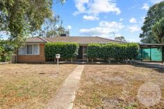  45 Dunn Avenue Forest Hill NSW 2651 $410,000 This three-bedroom house presents a remarkable opportunity for first home buyers, budding renovators, and investors. Each bedroom is fitted with practical built-in wardrobes, ensuring ample storage space for personal belongings. The property boasts ducted heating and cooling and an L-shaped lounge room, offering additional space that could be utilised as a home office or a cozy sitting area, perfect for those quiet afternoons with a book or tablet. The heart of the home, an open-plan kitchen and dining area, invites family togetherness and provides an ideal backdrop for entertaining guests. Stepping outside, the residence features a quaint back patio, presenting a charming spot for al fresco dining or simply enjoying the tranquility of the outdoors. The sizeable backyard includes a large garden shed, perfect for storing tools and gardening equipment, whilst also offering the potential for a workshop space or extra storage. The generous land size of 745.50 square metres provides an expansive canvas for those wishing to cultivate a garden oasis or considering an extension (STCA). Additionally, side access to the backyard enhances the convenience for larger projects or gatherings. Vehicle accommodation includes a carport, with the added bonus of extra space alongside it, suitable for parking a caravan, boat, or other recreational vehicles. This home represents a canvas awaiting personal touches and modernisation. Conveniently located near Forest Hill Shopping Centre, schools, and the airport, just a short 10-minute drive to Wagga's vibrant CBD. 