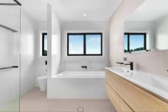  101 Lute Street Gundaroo NSW 2620 $1,550,000 - $1,650,000 Discover the perfect blend of modern elegance and timeless charm at this exquisite brand new 4 bedroom plus study residence located in Gundaroo's heights with expansive views over the village and surrounding region. This architectural masterpiece is designed to impress with its thoughtful layout and stylish finishes, making it an ideal family home or a sophisticated retreat for those seeking to work from home. The position is supreme sited at the top of Kyeema Estate on a hard to find 2.46acre (9963sqm) block. This allows plenty of extra space for shedding, boats and caravans or build the Taj Mahal of chook pens and have the chickens free-range across the block. The block is a blank canvass with excellent scope to create the edible gardens and orchards you've always dreamed of. Key Highlights: - Brand New Build: Completed in 2024. Custom built and never lived in. - Spacious Living: With four generously sized bedrooms, this home offers ample space for the family to have their own space and come together in the heart of the home in the open plan kitchen and meals areas. The master bedroom is particularly big and features a decadent en-suite bathroom and barn slider to the walk-in robe while a separate study provides extra flexibility as a 5th/guest bedroom. - Architectural Design: This home boasts stunning architectural elements, including an exterior comprised of red brick features, light grey render and monument coloured vertical cladding. With its high set ceilings, skylights and elegant double glazed black feature windows the interiors are flooded with natural light, seamlessly connecting indoor and outdoor spaces. - Stylish Interiors: The interior design reflects a harmonious blend of industrial chic and functional living, with high-end finishes throughout. Clean lines are accentuated by black door/tap hardware, hybrid flooring, feature panelling, and an abundance of joinery and feature lighting, some of which are sensor operated for ease. - Elegant Bathrooms: Enjoy the luxury of two beautifully designed bathrooms, complete with modern fixtures and finishes that elevate your daily routine. Under-tile heating adds an extra indulgence for the winter months. - Must Haves: Double glazed windows throughout, zoned ducted air-conditioning system, induction cooktop, stone benchtops and butlers pantry to kitchen, 50 point data cabling to communications rack in garage, mud room for extra storage, surround sound cabling to media room, ceiling fans throughout. A generous 107000 Litre rain water tank capacity. - Outdoor Oasis: The North Easterly orientation provides for a sheltered alfresco entertaining space which captures the cool summer Easterly's while a second SW facing entertaining deck is the perfect spot to finish the days end watching the sun set over the village and hills beyond. - Double Garage: A deep 7.5m x 7m double garage is a welcome addition with cabling in place to fit 2 EV car chargers (2 x separate 32A three-phase sub-circuits have been installed on either side of the garage) and extra shelving to the rear. - Space for expansion: A 14m x 14m site cut is in place for a future shed or tennis court with 3-phase power and communications cabling provisioned to a switchboard. - Prime Location: Situated a short walk in to the charming village of Gundaroo, with its Primary School, eateries, shop and park, makes this an ideal choice for families and professionals alike. School busses depart to Canberra's major schools for the older kids. Don't miss this opportunity to own a one-of-a-kind property that combines architectural elegance with modern convenience. Avoid the stress of building, just the landscaping to get underway and plenty of space to go around. 