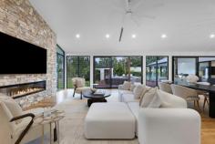  457 Tallebudgera Creek Road Tallebudgera Valley QLD 4228 $5,999,000 Welcome to "Willow Park," an extraordinary private sanctuary where contemporary luxury meets serene natural beauty. Nestled on an expansive and level 1.86-acre estate with direct frontage to the picturesque Tallebudgera Creek, this newly built residence is a masterpiece of modern design, offering a lifestyle of unparalleled tranquillity and sophistication. From the moment you arrive, an oversized glass entryway framed by a striking stone feature wall and elegant chandelier sets the tone for the grandeur that lies within. Beyond the welcoming foyer, the heart of the home unfolds into an expansive open-plan living, dining, and kitchen area, crowned by soaring cathedral ceilings with VJ panelling. Designed to embrace natural light and breath-taking views, floor-to-ceiling windows and a dramatic stone-clad feature wall create an atmosphere of refined opulence. The gourmet kitchen, an entertainer's dream, boasts an oversized island bench, premium Electrolux appliances, a glass splashback, and an integrated dishwasher drawer. A fully equipped butler's pantry with a wine fridge, additional sink, and Miele dishwasher ensures effortless hosting. Meanwhile, five generously proportioned bedrooms, four luxurious bathrooms, and an additional powder room are thoughtfully positioned throughout the home. The master suite, a private retreat in its own wing, is an oasis of indulgence. Overlooking the pool and lush surroundings, it features a custom-designed dressing room with bespoke cabinetry, a beauty station, and an opulent ensuite complete with a freestanding bath, dual vanity, and floor-to-ceiling tiling. Three additional bedrooms include custom built-in robes, with two enjoying the convenience of modern ensuites. A versatile fifth bedroom, ideal as a home office, completes the accommodation. For those who appreciate cinematic experiences, a soundproof media room offers the perfect setting for family movie nights or immersive entertainment. Step outside into an enchanting natural wonderland, where mature trees, manicured lawns, and pristine creek frontage create a breathtaking backdrop. A vast covered timber deck, complete with an outdoor kitchen, sets the stage for unforgettable alfresco gatherings, while the resort-style pool, featuring a diving board and timber decking, invites endless enjoyment. For moments of relaxation, a spa and sun deck await, along with a charming poolside pavilion where you will find the sauna and a separate pool house with barn-style entry and powder room. As the sun sets, gather around the firepit and soak in the peaceful ambience of this unparalleled setting or move to the purpose built creek side deck overlooking the sprawling lawn. Every aspect of this home has been carefully curated for comfort and convenience. State-of-the-art inclusions such as ducted air-conditioning, LED lighting, security alarm and CCTV cameras, Wi-Fi boosters, an electric gated entrance with intercom, and a Yale security system ensure effortless modern living. Sustainable features include a 13.2kW solar system, electric hot water, and town water supply with additional pumping rights from Tallebudgera Creek. Perfectly positioned, "Willow Park" is just minutes from top-tier schools such as Tallebudgera State School and St. Andrews Lutheran College. The iconic beaches of Burleigh Heads, Palm Beach, and Currumbin are within a short drive, offering the best of coastal living, while Gold Coast Airport and Surfers Paradise are also easily accessible. This exceptional residence is a rare opportunity to secure a home of distinction in one of the most sought-after locations. All the hard work has been done—simply move in and immerse yourself in the luxury and serenity of "Willow Park." Arrange your private inspection today and experience the pinnacle of Gold Coast acreage living. - Ducted air-conditioning - LED lighting - Security alarm and CCTV cameras - Wi-Fi boosters - Electric gated entrance with intercom - Yale security system - 13.2kW solar system - Electric hot water - Town water supply with additional pumping rights from Tallebudgera Creek - Property features: - Expansive and level 1.86-acre estate with Tallebudgera Creek frontage - Newly built, architecturally designed home - Oversized glass entryway with a stone feature wall and chandelier - Open-plan living, dining, and kitchen area with cathedral ceilings - Floor-to-ceiling windows and a striking stone-clad feature wall - Gourmet kitchen with an oversized island, premium Electrolux appliances, and glass splashback - Butler's pantry with a wine fridge, sink, and Miele dishwasher - Soundproof media room for immersive entertainment - Five spacious bedrooms, including a master retreat in its own wing - Four luxurious bathrooms plus an additional powder room - Master suite with custom dressing room, beauty station, and spa-like ensuite - Covered timber deck with an outdoor kitchen - Resort-style pool with diving board and timber decking - Spa, sun deck, and poolside pavilion - Firepit area for relaxed evenings outdoors - Pool house with barn-style entry and powder room Location benefits: - Approx. 5 mins to Tallebudgera State School and local shops - Approx. 5 mins to St. Andrews Lutheran College - Approx. 11 mins to Burleigh Heads - Approx. 12 mins to Palm Beach - Approx. 14 mins to Currumbin Beach - Approx. 18 mins to Gold Coast Airport - Approx. 39 mins to Surfers Paradise 