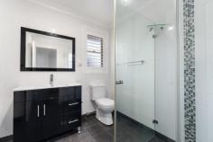  3/43 Dewberry Close Menai NSW 2234 Nestled in a peaceful, resort-style estate just moments from all the amenities Menai township has to offer, this beautifully presented townhouse offers the perfect blend of privacy and low maintenance living. Inside, you'll find spacious, light filled interiors complemented by a modern kitchen with glass doors allowing seamless access to the rear yard and beautiful covered alfresco area, the ideal place to entertain family and friends. There are three generous bedrooms, the master suite features its own ensuite and walk-in wardrobe, while the other bedrooms also include built-in robes as well as a spacious family bathroom with bathtub. Additional highlights include plantation shutters, air conditioning, an internal laundry with a separate toilet on the lower level and an oversized double car garage with remote access. Spacious light filled interiors 3 generous bedrooms, main with ensuite and WIR Both of the other bedrooms with BIRs Modern bathroom with separate shower and bath, laundry with additional toilet Sunny low maintenance private courtyard with paved area and level lawn Conveniently located close to shops, schools, parks, and public transport Access to swimming pool, tennis court and club house, you will feel like you're on holiday all year round. Perfect for the astute investor, first home buyers or those looking to downsize without compromising on style or space, to truly appreciate everything this home has to offer an inspection is a must. • Council rates $381.40pq • Strata $ 969.12pq 